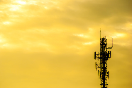 silhouette of electric post on eveningの写真素材
