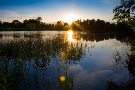 cloud mirrored in the lakeの写真素材