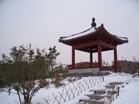 Traditional Chinese pavilion in the snowの写真素材