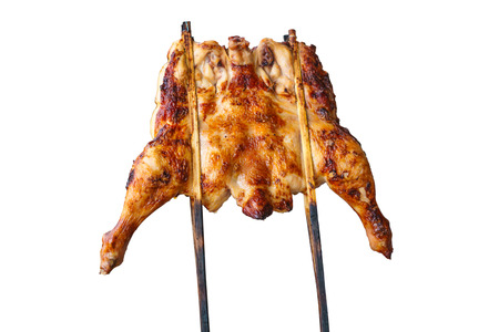 Thai street food grilled chicken isolated on white background with clipping paths.の写真素材