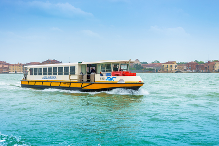 Venice, Italy - April 27, 2017: Tourist boat on Grand Canal, which is heading to Venice, Italy.のeditorial素材