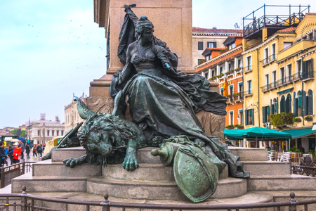 Venice, Italy - April 27, 2017: Metal statue of a girl on the base of The Victor Emmanuel II Monument in Venice, Italy.のeditorial素材