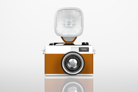 3d rendering front view of a retro vintage camera with flash on top isolated on white background with clipping paths for easy to split out.の写真素材