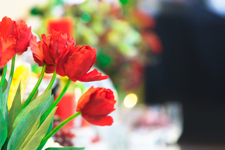 Beautiful fake red rose with blurry background.の写真素材