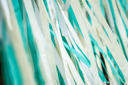 close-up shot of fabric ribbons curtain doorway decoration.の写真素材