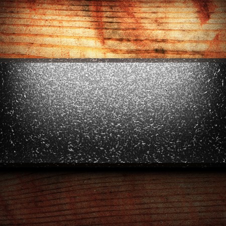 iron plate on wood made in 3Dの写真素材