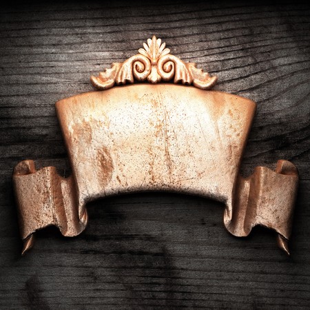 golden ornament on wood made in 3Dの写真素材
