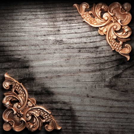 golden ornament on wood made in 3Dの写真素材