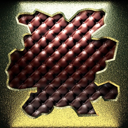 golden plate on leather made in 3Dの写真素材