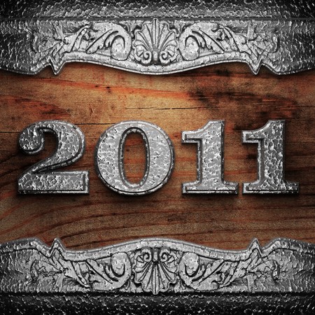 2011 iron ornament on wood made in 3Dの写真素材