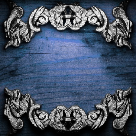 iron ornament on wood made in 3Dの写真素材