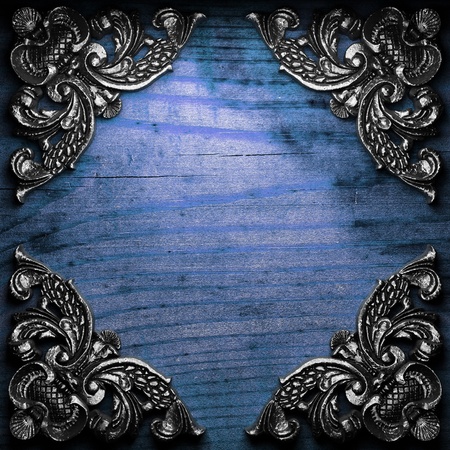 iron ornament on wood made in 3Dの写真素材