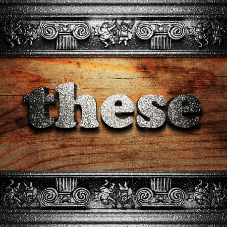 iron word on wood made in 3Dの写真素材