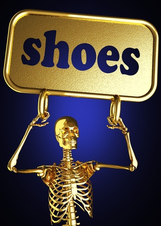 Golden skeleton holding the sign made in 3Dの写真素材