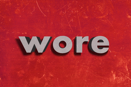 gray word on red wallの写真素材