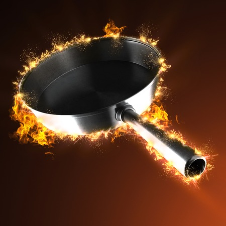 empty pan in fireの写真素材
