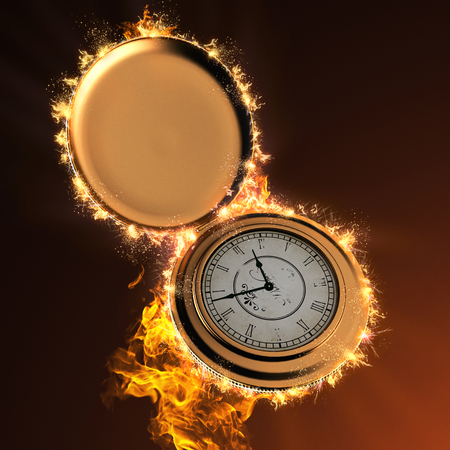 retro pocket watch in fireの写真素材