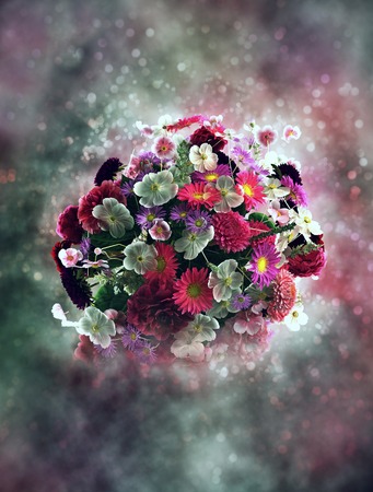bouquet of flowers in smoke with bokehの写真素材