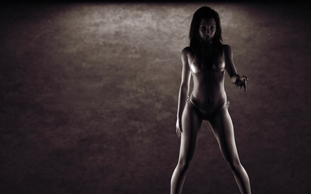 sexy woman near the stone wallの写真素材