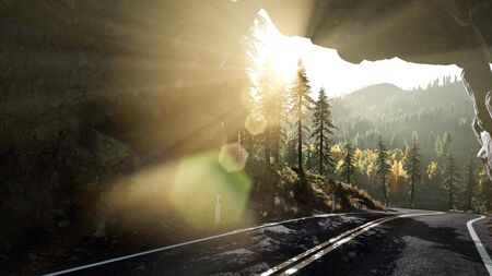 rocky road tonel in mountain at sunsetの写真素材