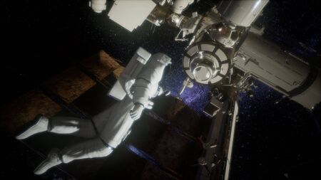 Astronaut outside the International Space Station on a spacewalk.の写真素材