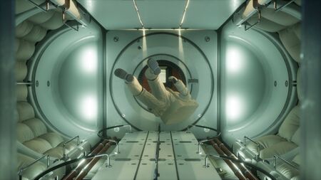 astronaut inside the orbital space station.の写真素材