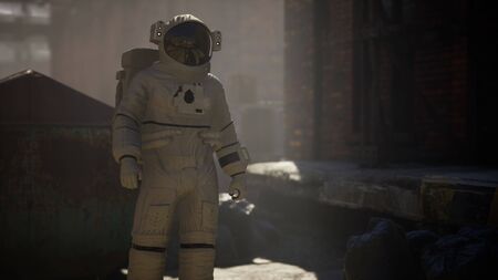 Lost Astronaut near Abandoned Industrial Buildings of Old Factory