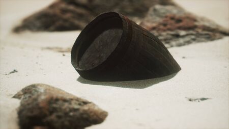 Old wooden barrel on the beach