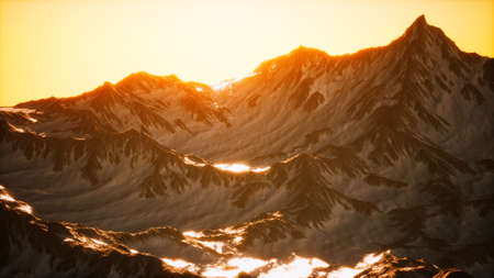Aerial view of the Alps mountains in snowの写真素材