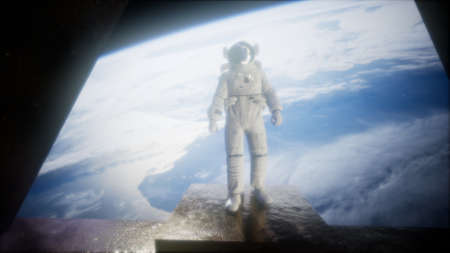 astronaut on the space observatory station near Earth.の写真素材
