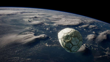old soccer ball in space on Earth orbit.