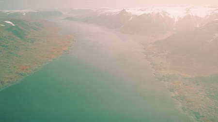 Norway fjord reflection in clear waterの写真素材