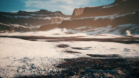 rocks and hills under the snowの写真素材