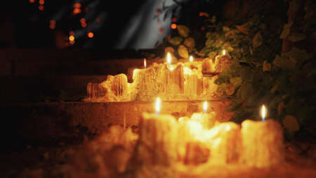candles burning in the dark