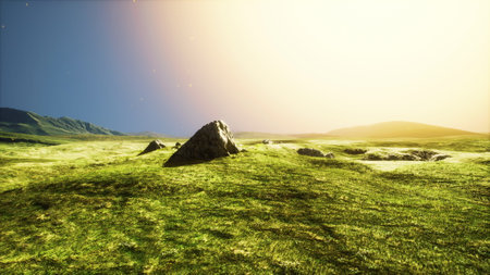 mountain landscape at sunset with tone in the foreground on the fieldの写真素材