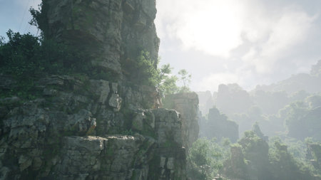 A stunning rocky cliff with lush vegetation overlooking a breathtaking mountainous landscape