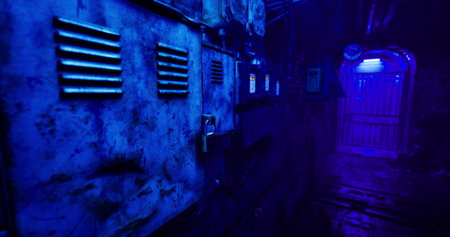 A dimly lit alleyway features metallic lockers against a textured wall. Blue light spills into the space, creating an eerie atmosphere typical of neglected urban areas at night.の写真素材