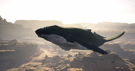 A majestic whale glides gracefully over the Grand Canyon, showcasing its immense size and beauty against the backdrop of the stunning rock formations in bright afternoon light.の写真素材