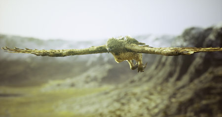A hawk glides gracefully through the sky, its wings fully extended. Below, rocky terrain and distant mountains emphasize the beauty of nature on a clear day.の写真素材