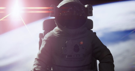 An astronaut floats in space, wearing a space suit and helmet, while gazing at Earth below. The sun...