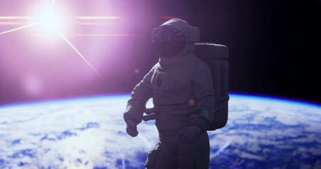 An astronaut in a space suit is floating amidst the vastness of space with Earth visible below and sunlight illuminating the scene. The cosmic backdrop enhances the experience of space exploration.の写真素材