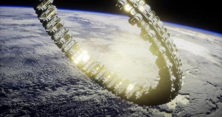 A futuristic habitat ring orbits Earth against a backdrop of clouds and blue atmosphere. The structure shines with bright lights, highlighting innovative design in space living.の写真素材