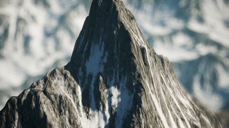 Crisp and clear, sunlight bathes the towering mountain, highlighting its rugged cliffs and patches...