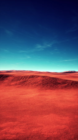 A vibrant red field under a bright blue sky.