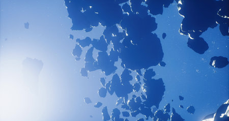 A stunning view of rocky formations scattered throughout deep blue space illuminated by sunlight...