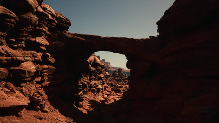 A formation of rocks with a hole in the middle, showcasing natural erosion processes.の写真素材
