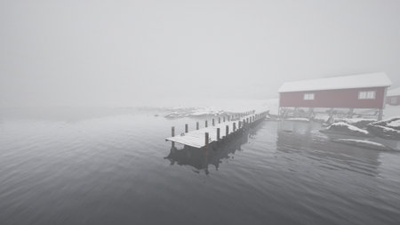 An old wooden pier stands covered in snow, nestled in the icy waters of the Norwegian sea.