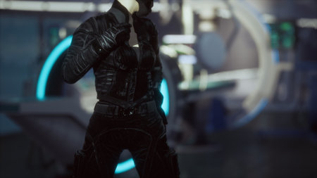 A striking character dressed in a form fitting black outfit stands poised in a high tech environment filled with glowing screens.の写真素材