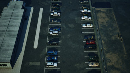 a bustling parking lot packed with a multitude of parked cars, highlighting the busy nature of the area.の写真素材