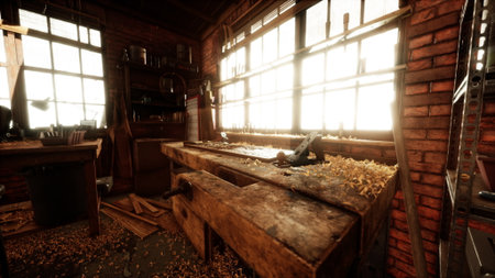 Sunlight pours through large windows in a warm woodworking workshop. A sturdy wooden workbench is covered in shavings, revealing the art of craftsmanship in progress.の写真素材